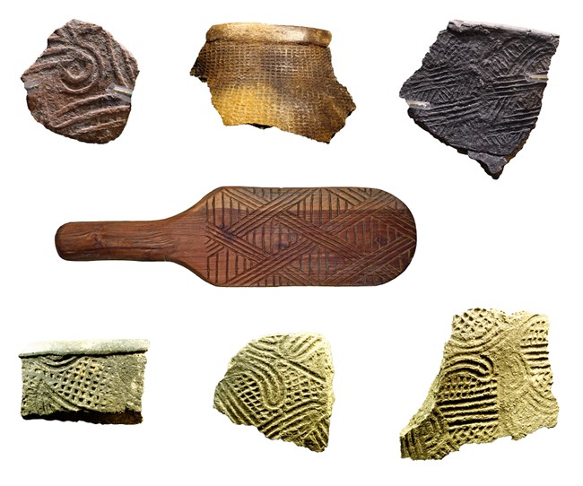 Collection of Woodland sherds and a paddle