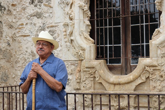 Vicent Huizar, descendent of Pedro Huizar standing by the Rose Window