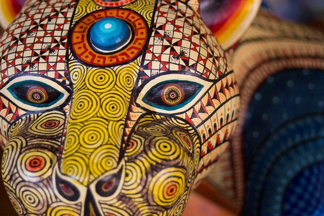 alebrijes7 Alebrije colorful wood carving of a wild cat