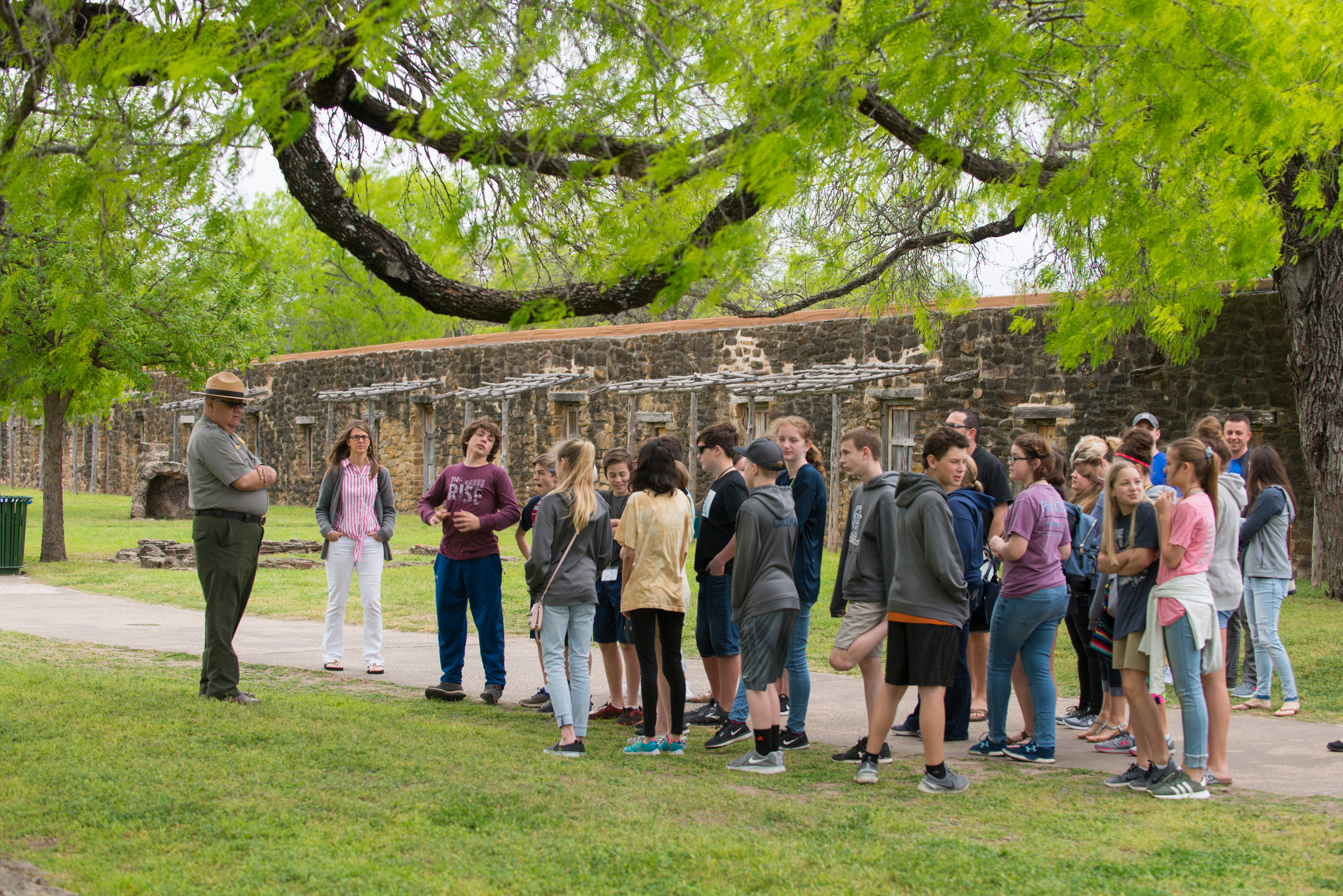 Park Ranger guides group of school children in Mission San Jose Park Ranger guides group of school children in Mission San Jose
