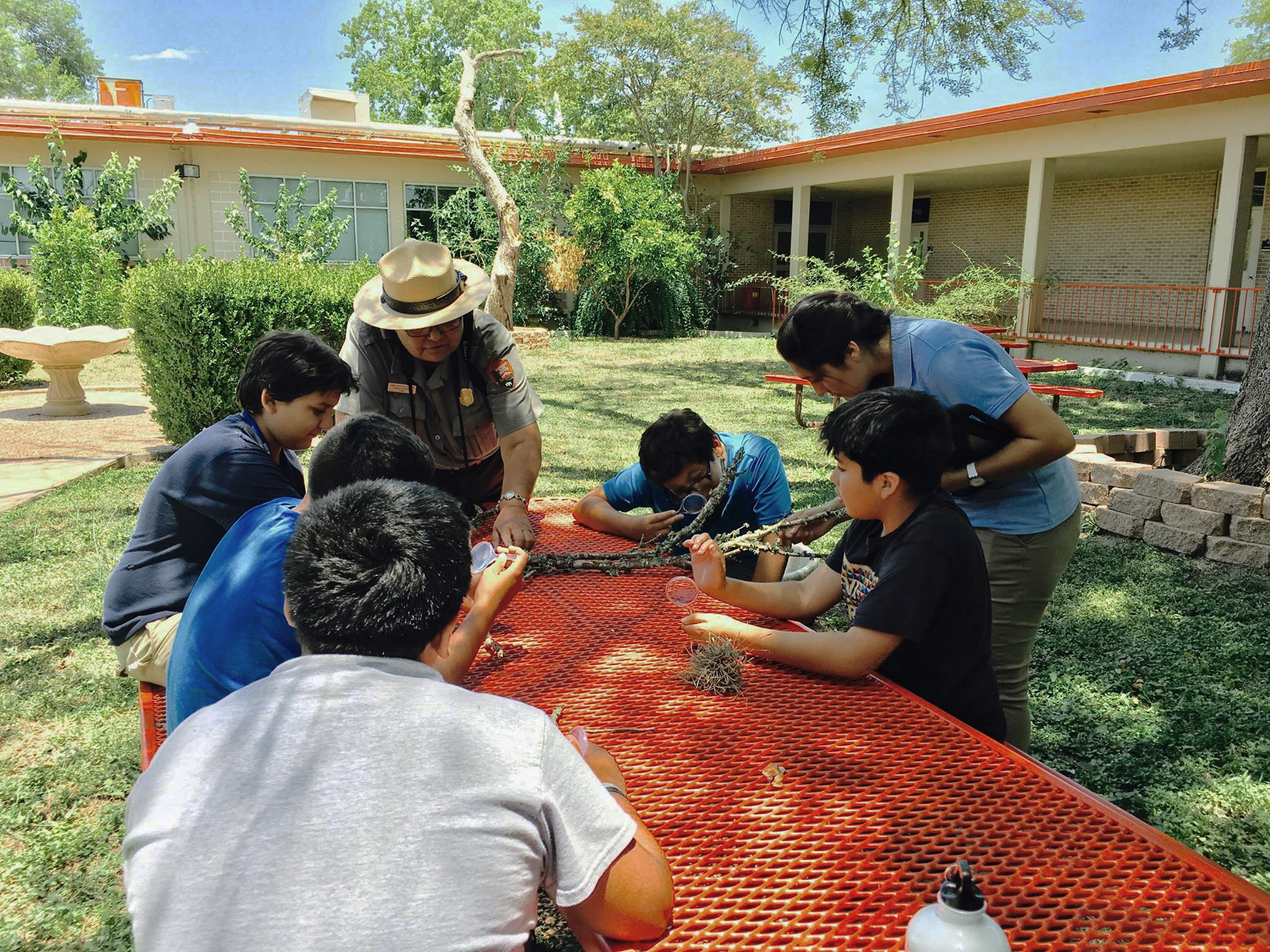 Park Ranger teaching youth about the park, offsite