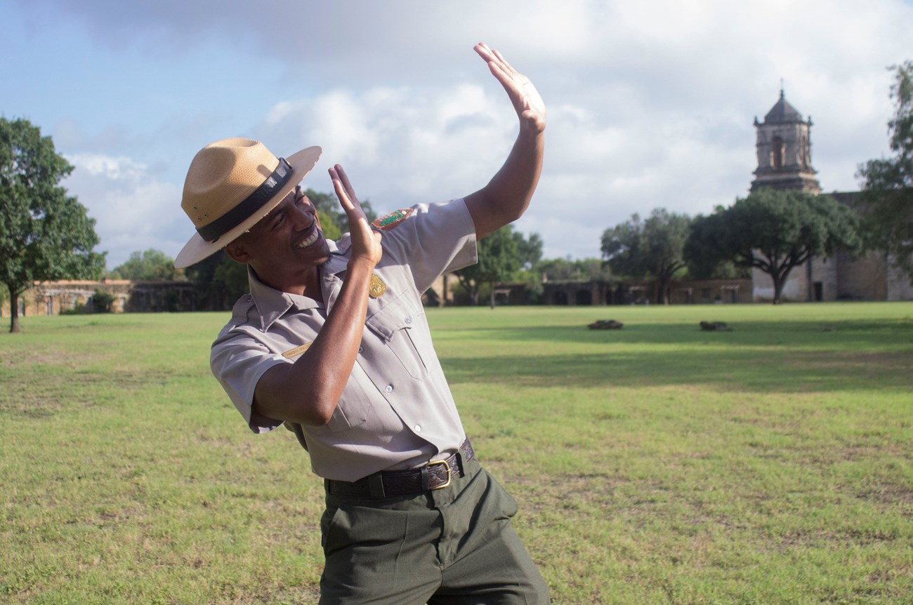 Park Ranger reacts to heat at San Antonio Missions