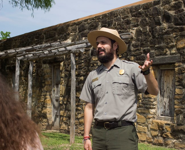 Park Ranger guides a tour in Spanish at Mission San Jose