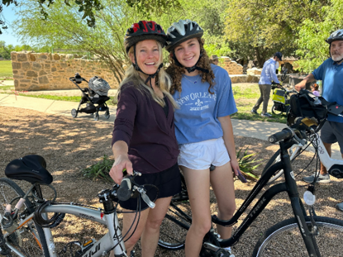 Two women with bikes