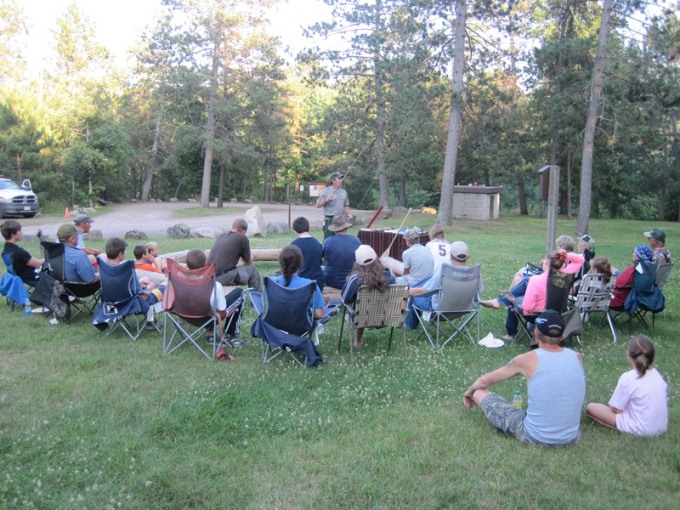 A park anger shares some insights into the sport of fly fishing in this image. NPS photo.