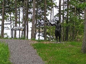 Wayside exhibit and bronze statue