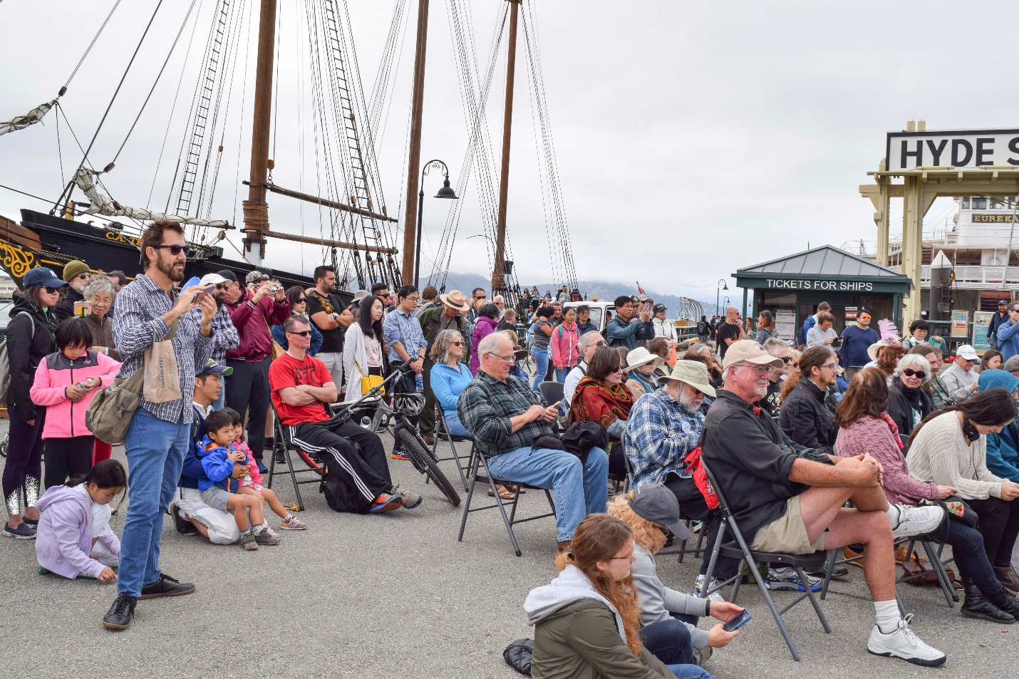Audience members enjoying midpier stage performances. Audience members enjoying midpier stage performances.