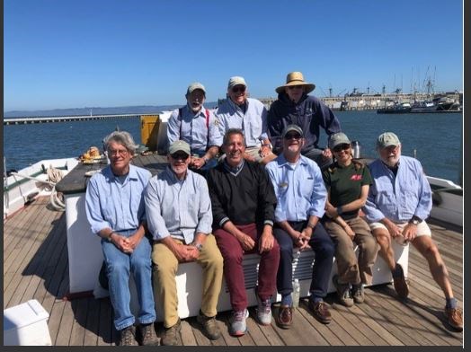Scow schooner ALMA crew take a break with Superintendent Paul Deprey