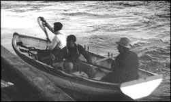 A pilot yawl comes alongside a steam schooner off San Francisco, CA, about 1900. J10.17,297n A pilot yawl comes alongside a steam schooner off San Francisco, CA, about 1900. J10.17,297n