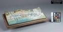 Color photo of the topographical model of the shipyard on a brown wooden stand