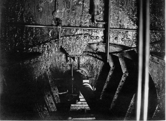 The dark, oily interior of a stemship.