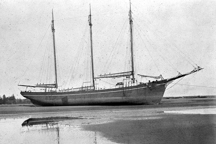 A wooden sailing vessel with three masts. SAFR E3.8495n