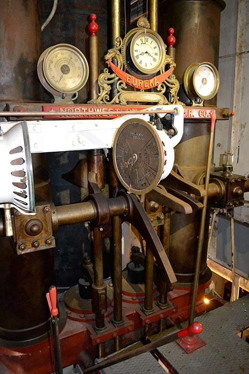 Various dials and levers used to control a ferryboat engine.