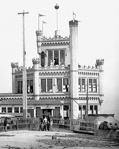 A historic photo of an elaborate structure that has several turrets.