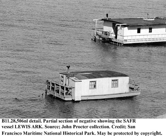 Two houseboats floating on the water.