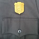 NPS uniform pocket with gold badge NPS uniform pocket with gold badge