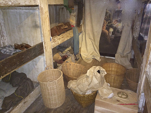 Wooden bunks on an 19th century sailing ship.