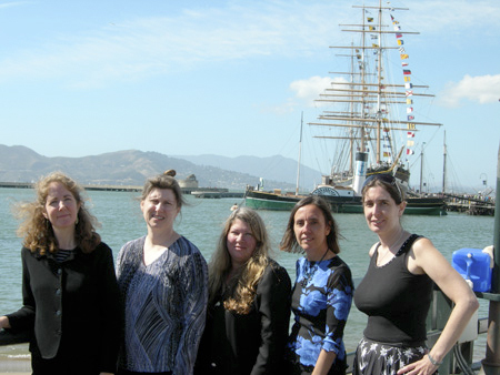 The Johnson Girls musical group standing on Hyde Street Pier.