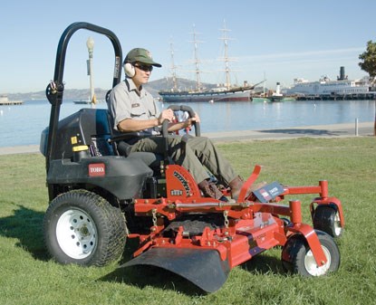 The park's new red-colored ride-on mower runs on B100, a 100% vegetable-based diesel fuel.