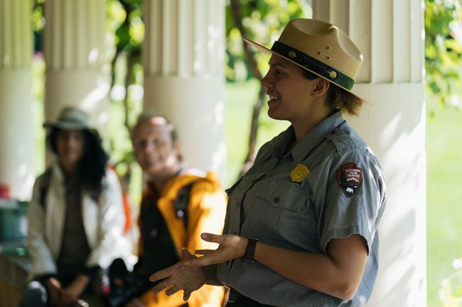 ranger giving tour on pergola