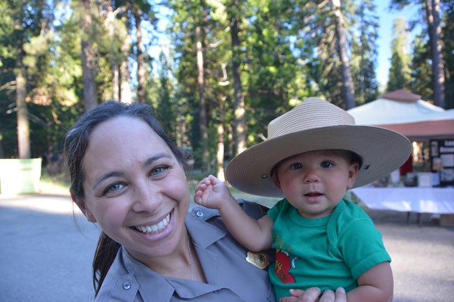 ranger holding child