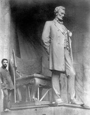 Augustus Saint-Gaudens with finished clay model of his statue "Abraham Lincoln the Man"