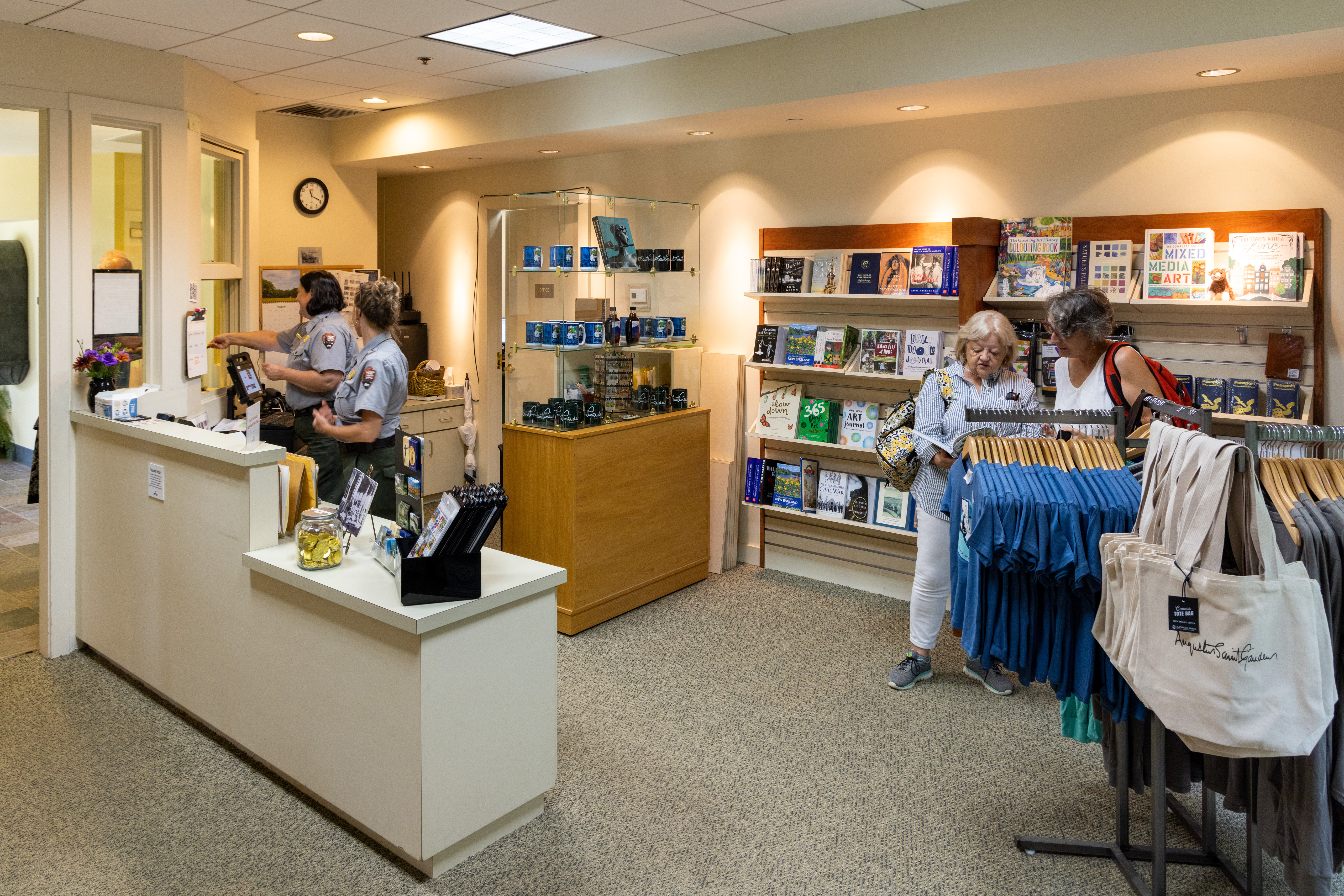 Gift store with book shelfs and racks of clothing