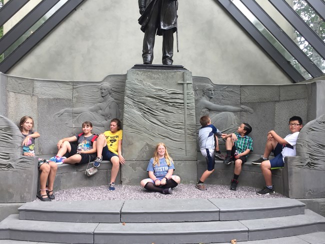 Campers pose with Farragut Monument