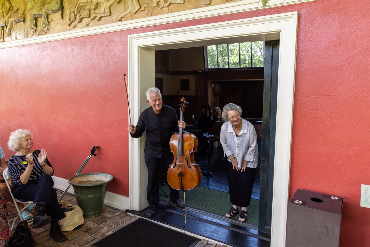 two musicians bow