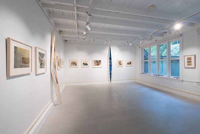 gallery with white wall and photos