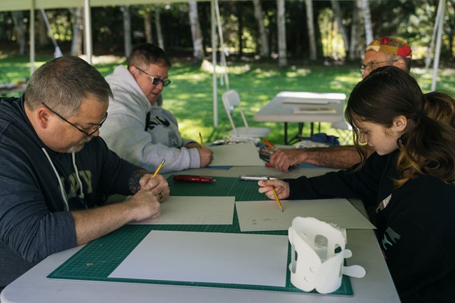 family doing art activity