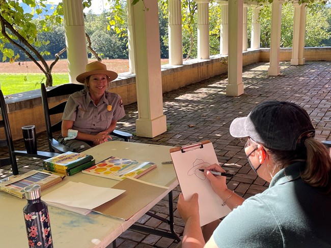 artist draws cartoon of ranger