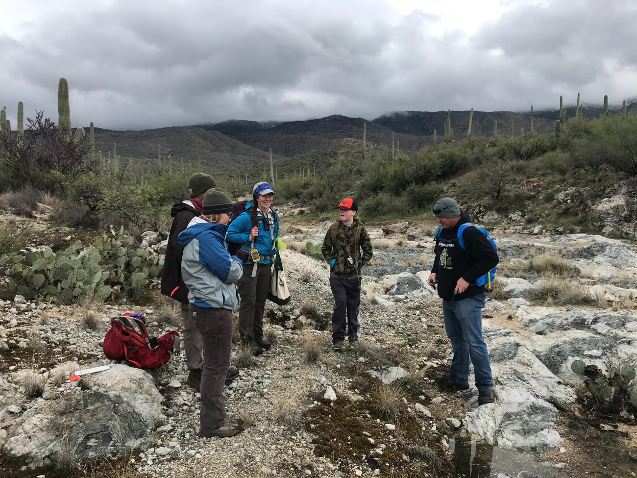 Park staffs and volunteers Group of people talking in a circle