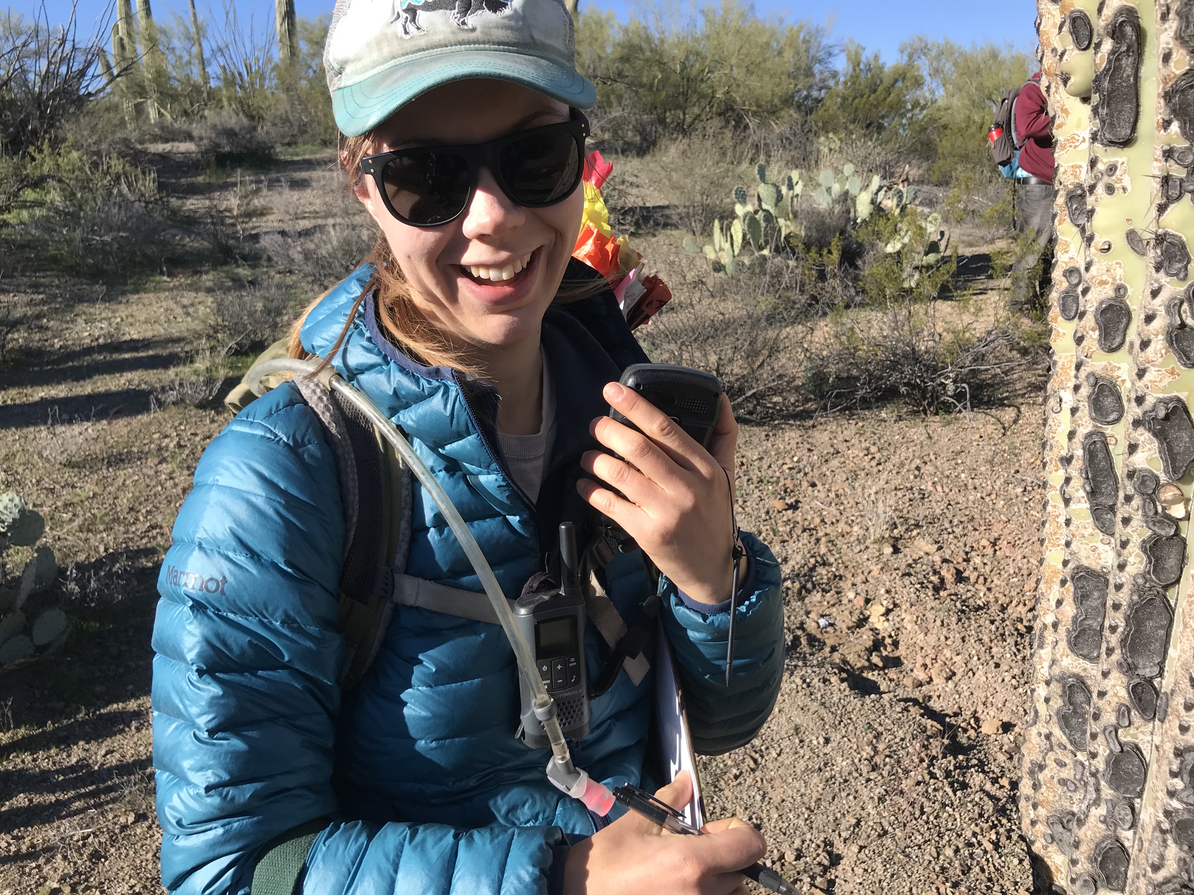 Park staff smiles with GPS
