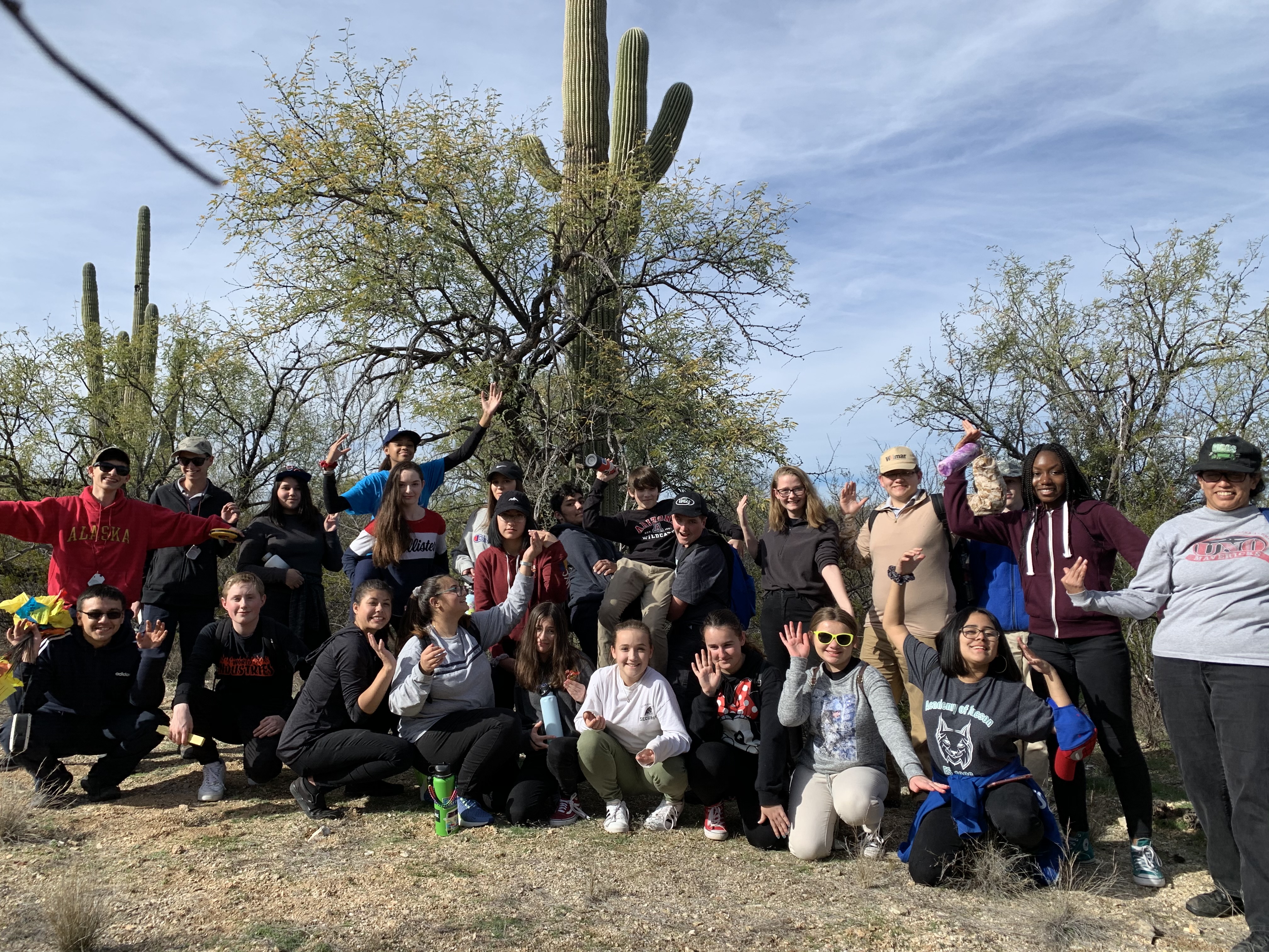 Students posing like a saguaro.