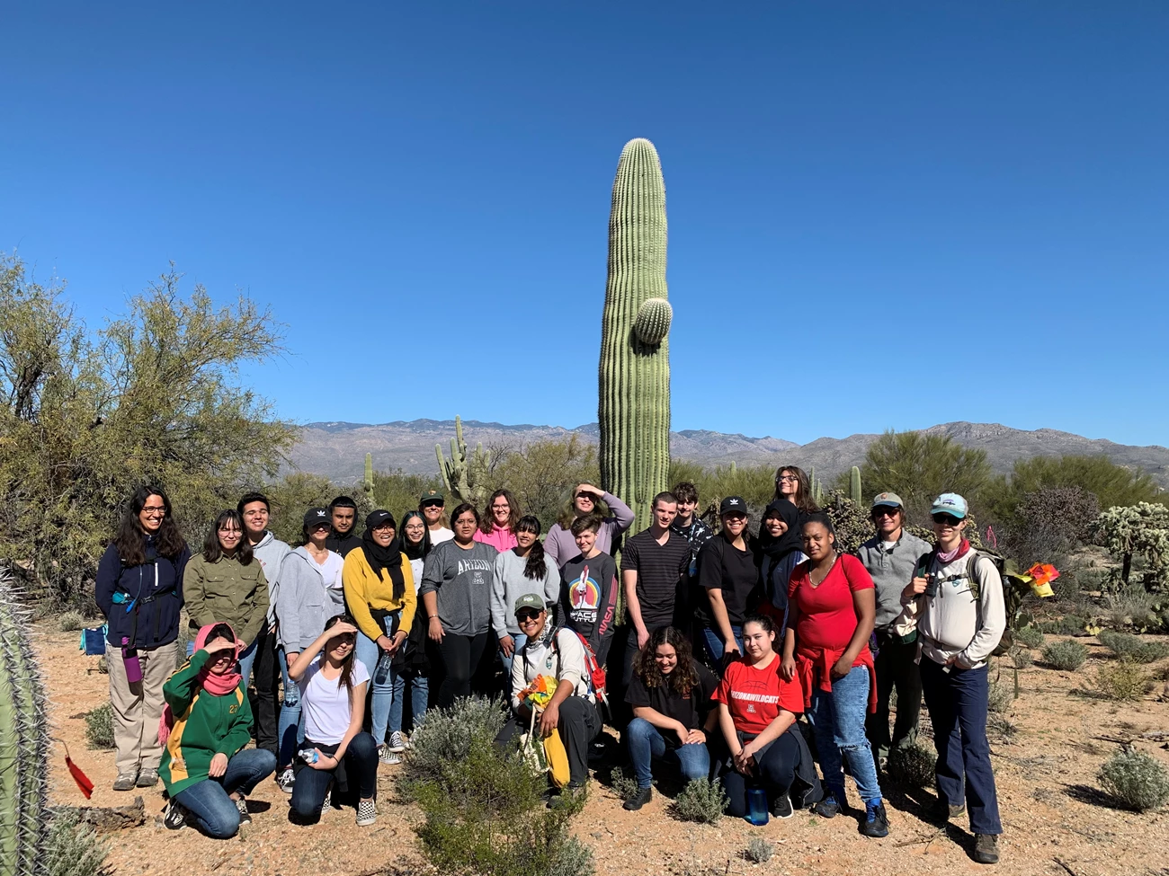 Arizona College Prep Academy Students and park staff smiling for a photo after the census.