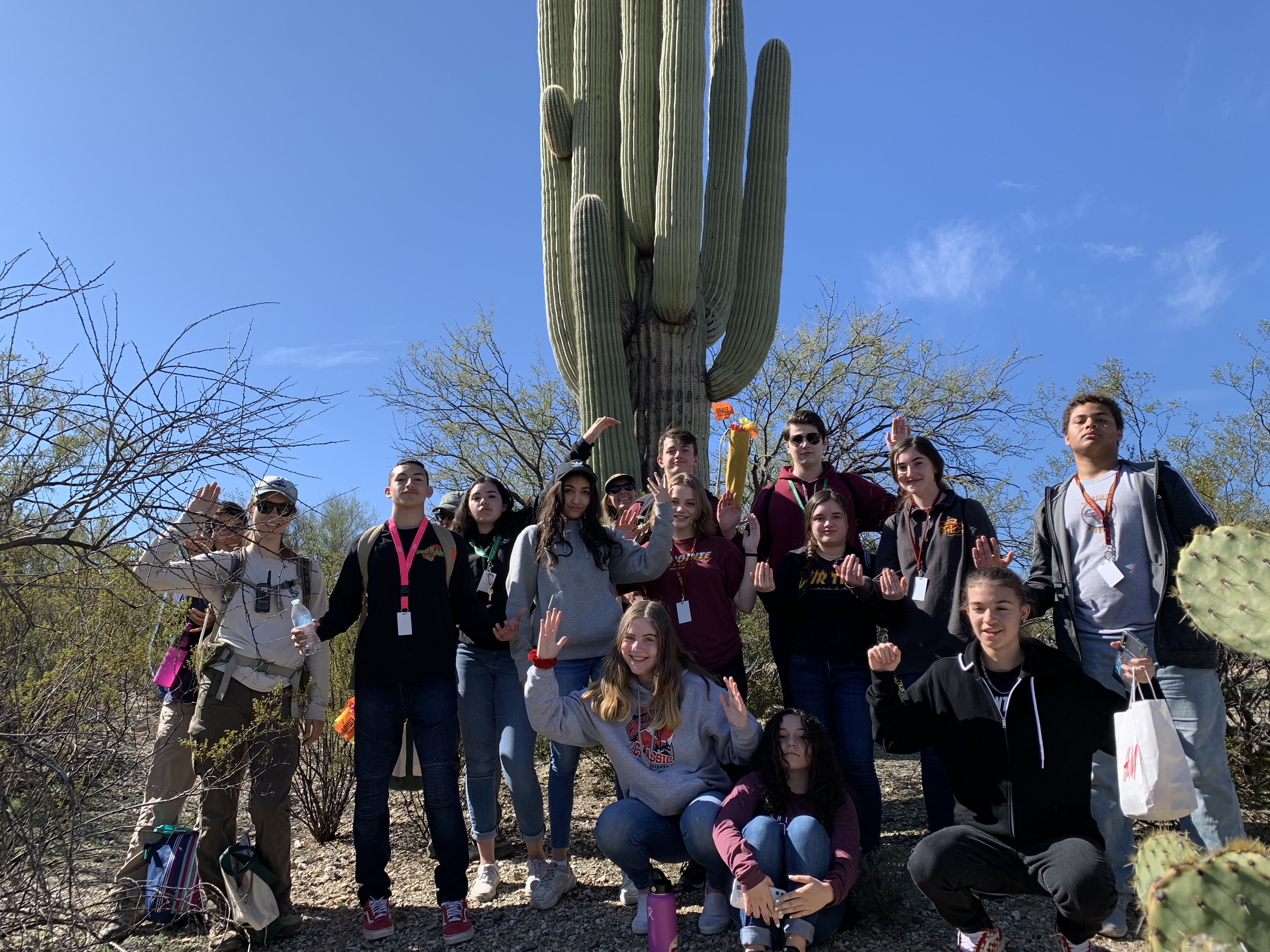 Students posing like a saguaro.