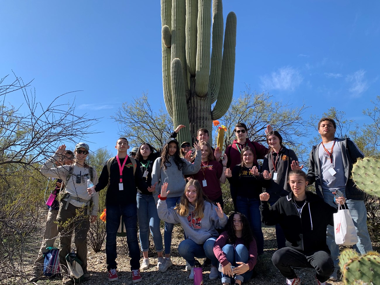Students posing like a saguaro.