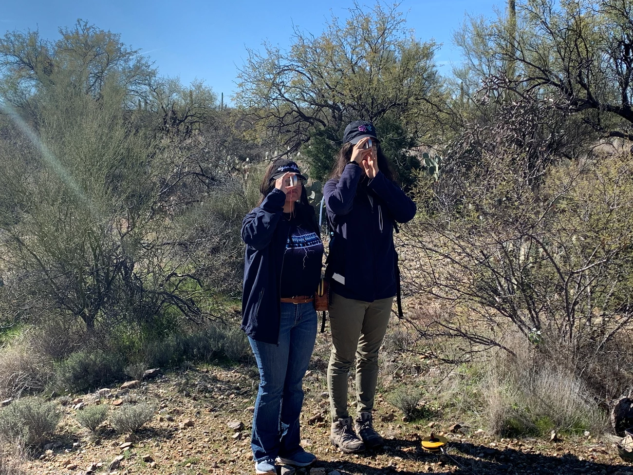 Students take measurements using clinometer Students take measurements using clinometer