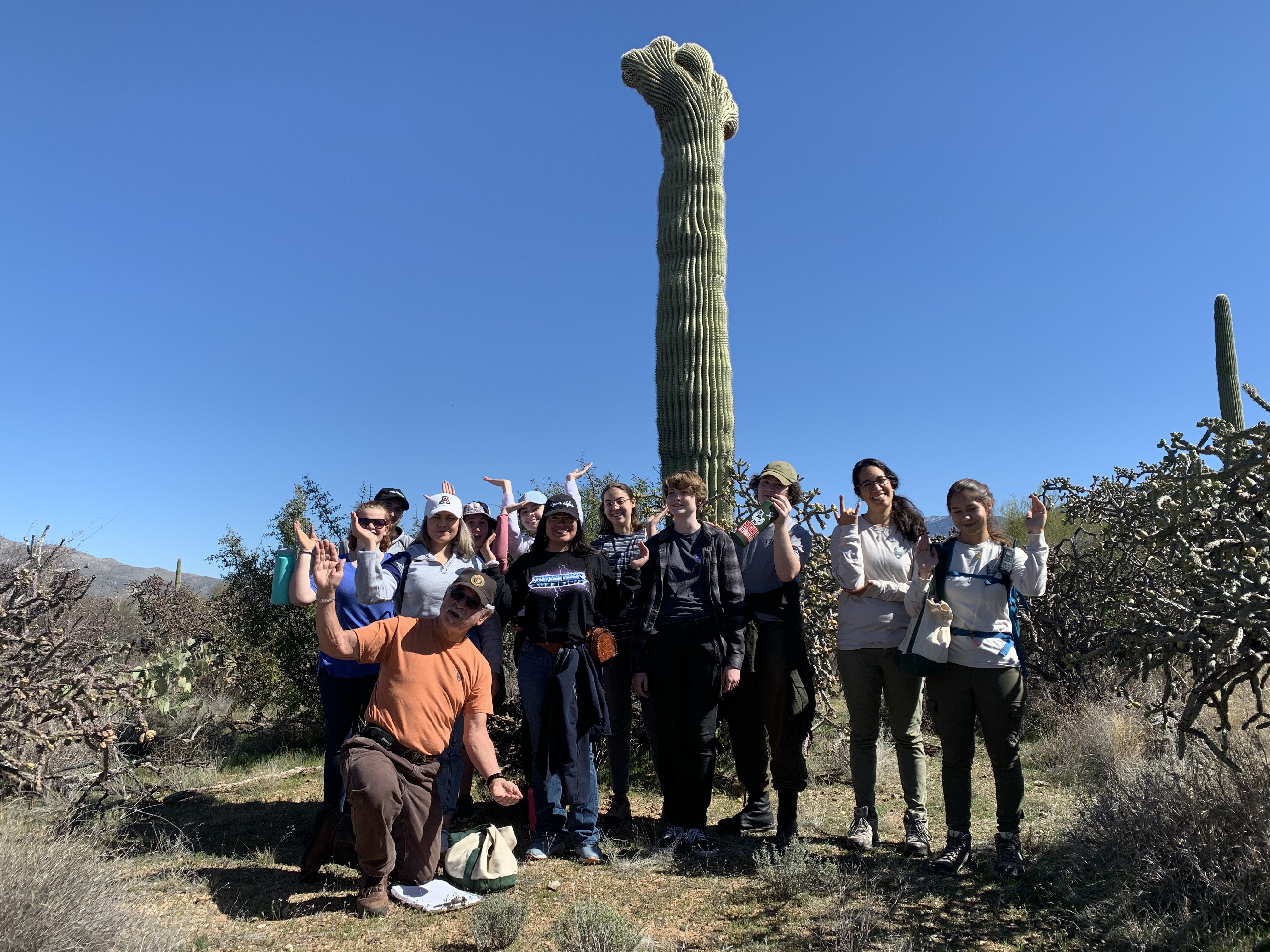 Biodiversity class group photo saguaro pose