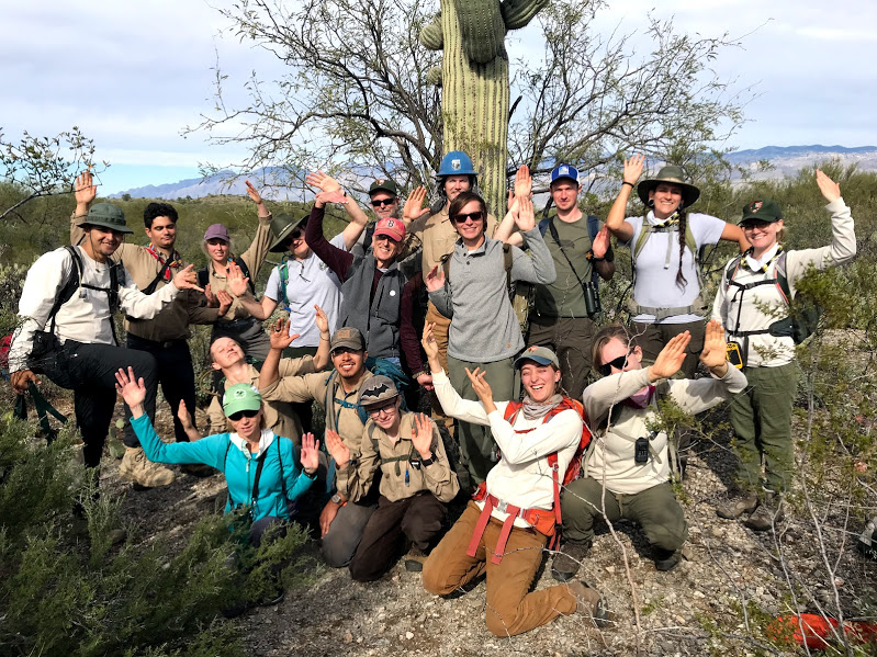 Park staff posing like a saguaro