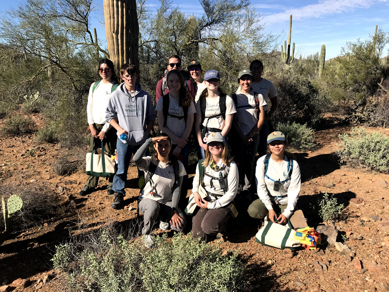 Students posing for a photo on the plot after the census