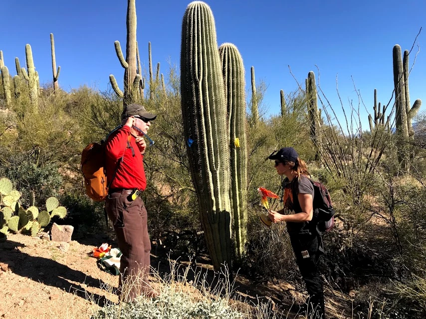 Adventure Scientists Two people talking.