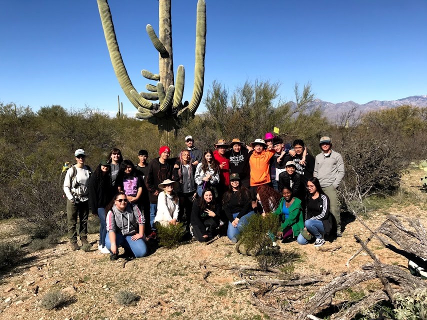 Group photo of student volunteers and park staff after the census. They are all smiling.