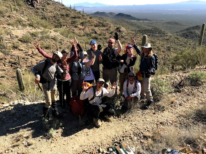 Adventure Scientists group photo saguaro pose