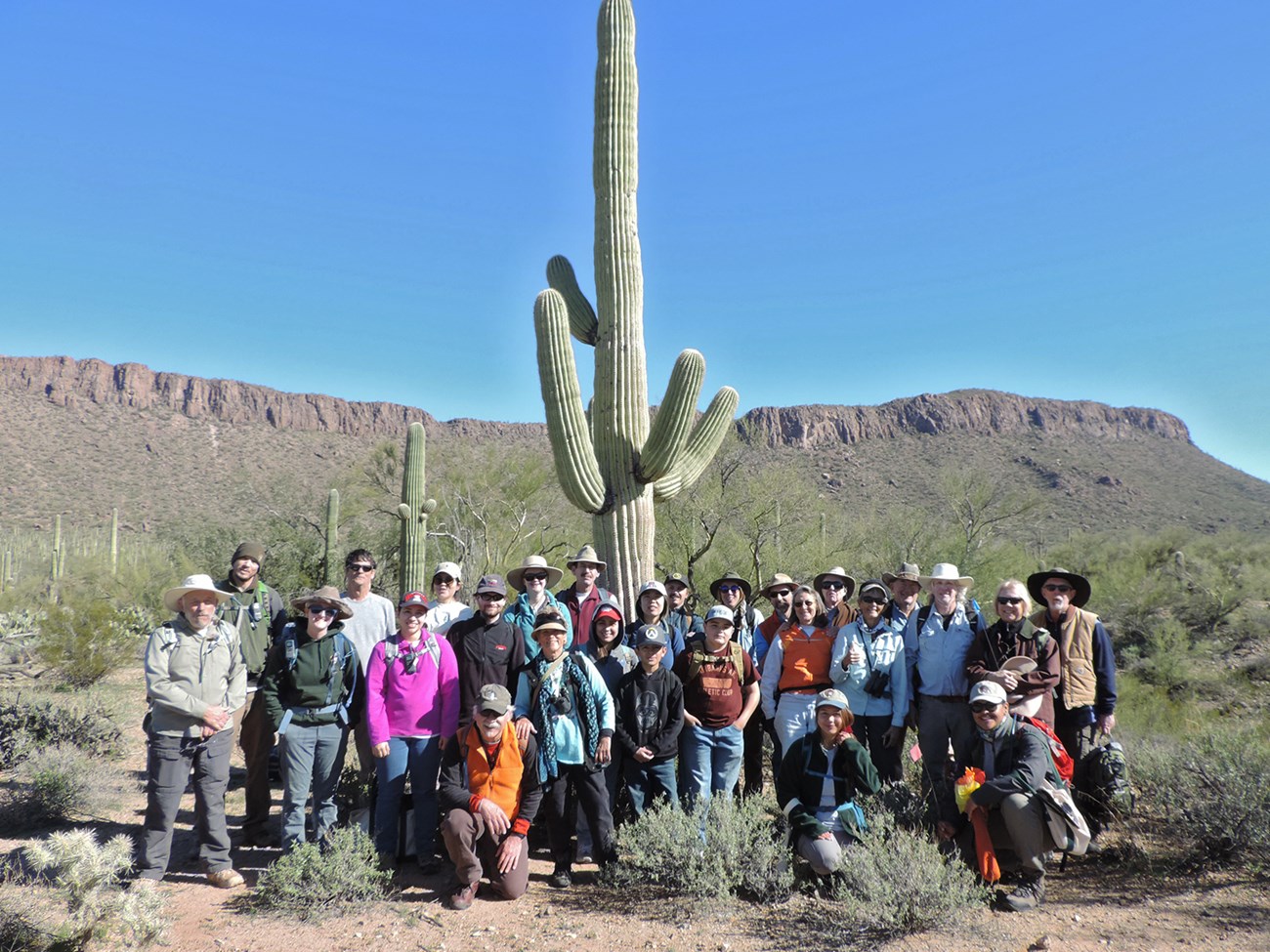 Group photo of volunteers after the census. Everyone is smiling.