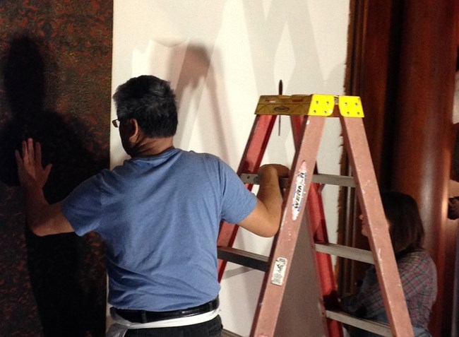 NEDCC staff rehang North Room wallpaper NEDCC staff rehang North Room wallpaper