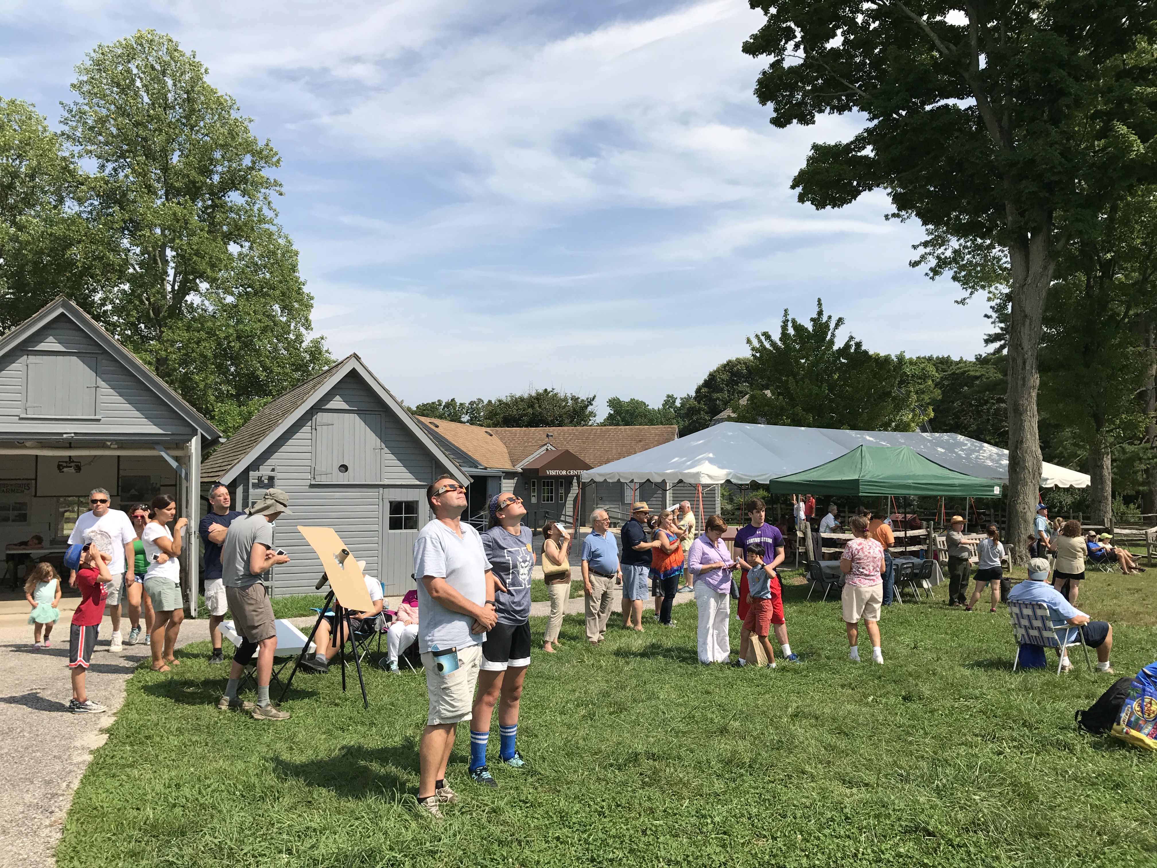 Visitors view the solar eclipse.