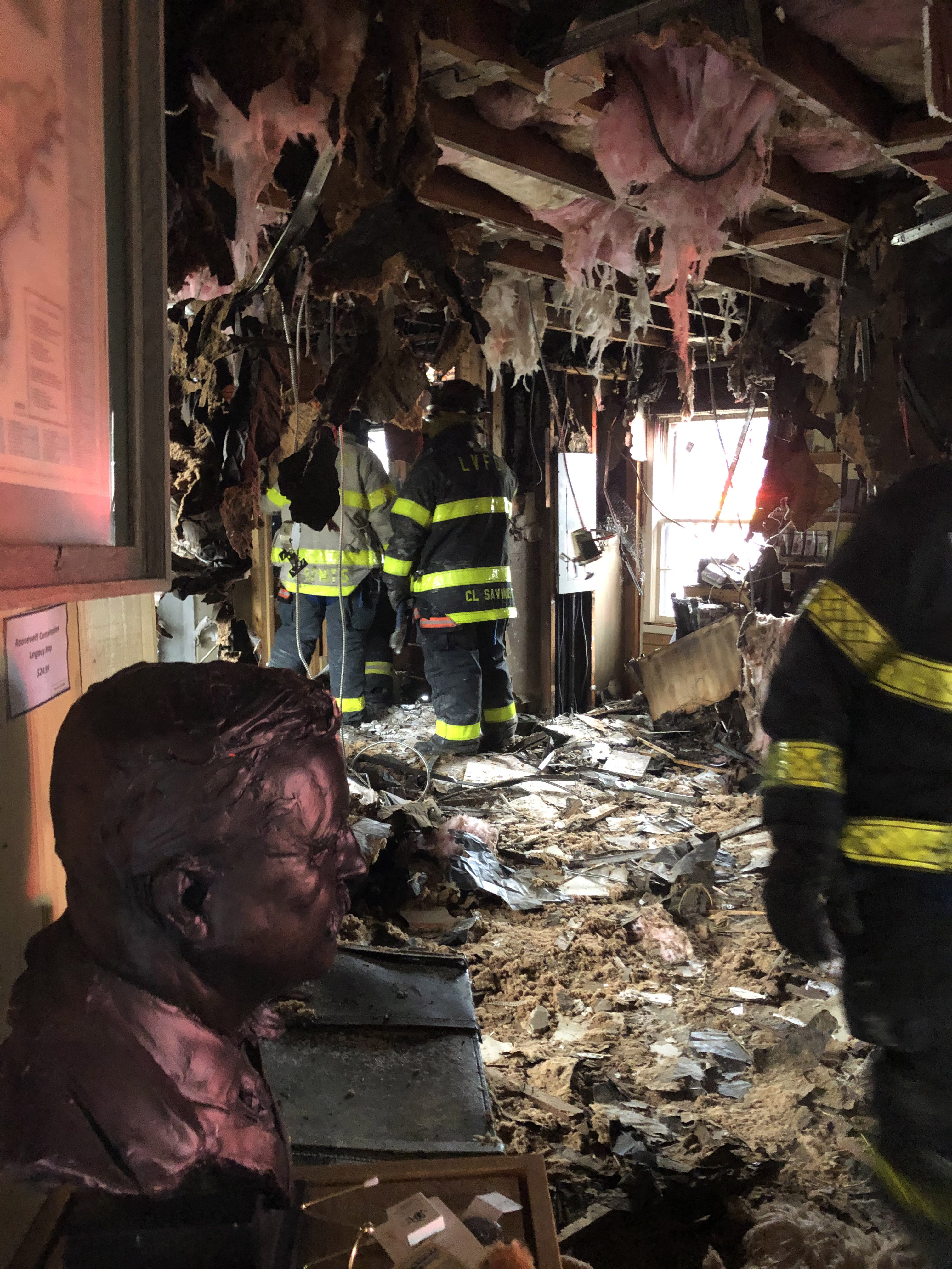 VCFire_IMG_4550_3x4 Firefighters survey8ing damage in teh Sagamore HIll Visitor Center following a fire on December 24, 2018