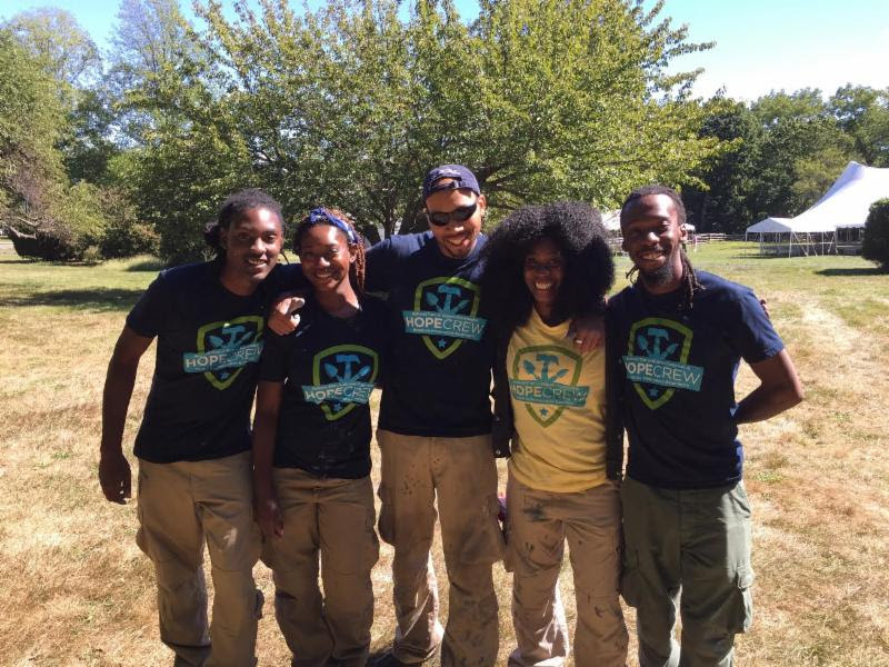 Five HOPE crew volunteers posing on the lawn at Sagamore Hill. NPS Photo